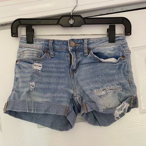 light washed slightly ripped aero jean shorts